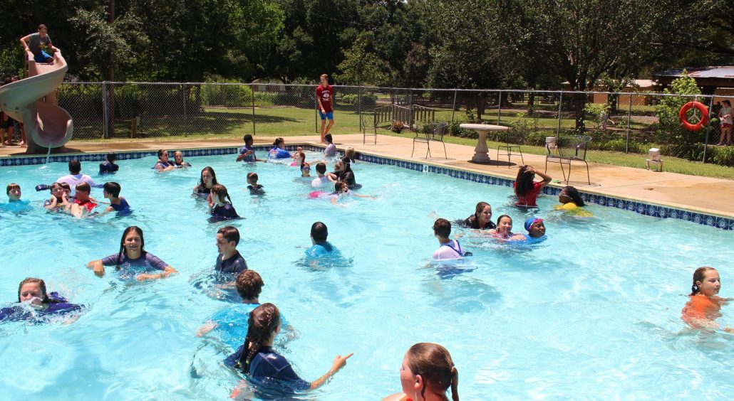 A full pool on a summer afternoon