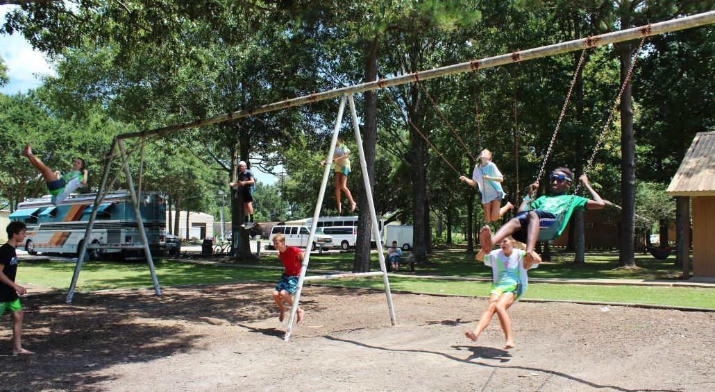 Campers on the giant swing set