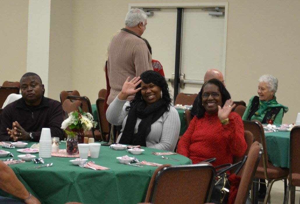 Guests enjoying a fellowship meal